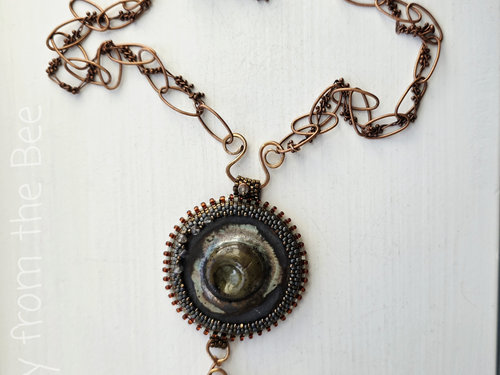 Nature inspired statement necklace in copper, ceramic and glass