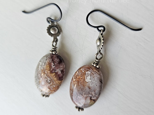 Gemstone earrings in shades of greys and reds