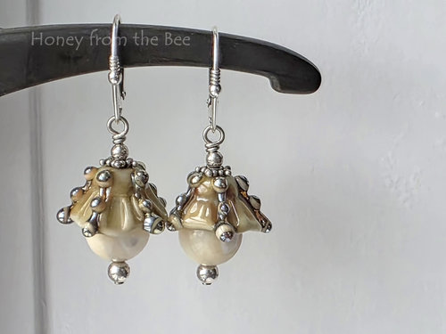 Cream and silver earrings in ocean theme