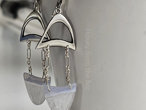 One of a kind artisan earrings features blue lace agate and sterling silver