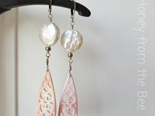 Carved shell earrings with white coin pearl