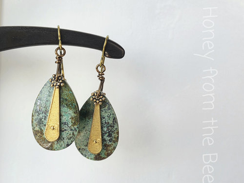 Green and gold earrings