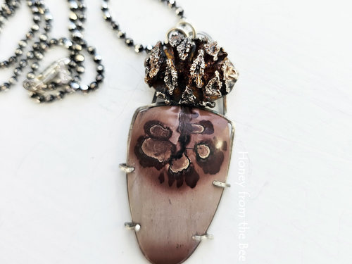 Cast sterling silver pinecone complements the Apache sage cabochon in this nature inspired pendant necklace