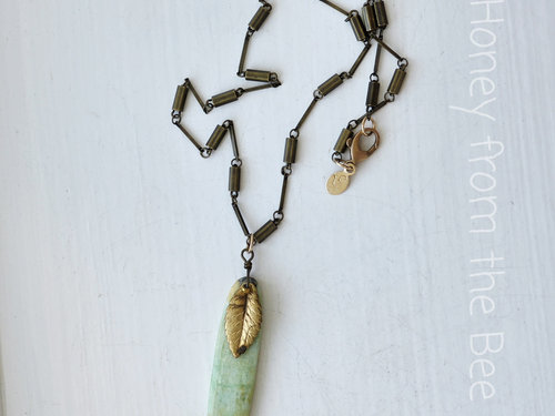 Nature inspired pendant features chrysophase and brass