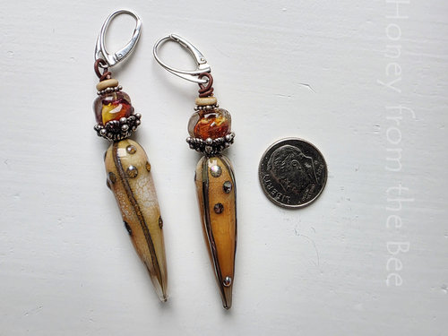 One of a kind earrings in orange, cream and silver