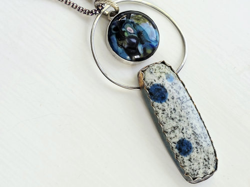 Blue and silver pendant features K2 granite cabochon