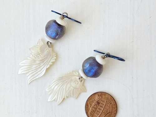 Koi earrings feature mother of pearl and lampwork glass