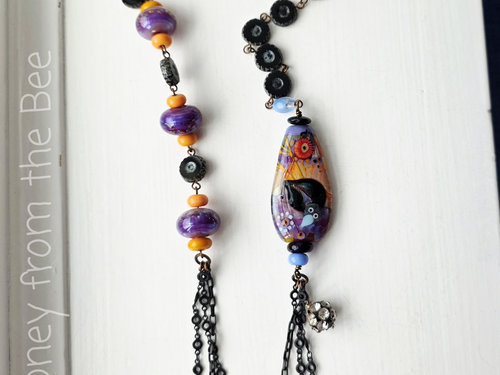 One of a kind lampwork necklace in purple, blue and orange