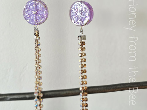 Lavender earrings feature snowflake and crystals