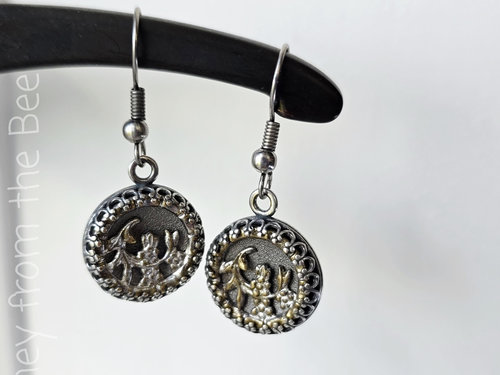 Antique button earrings with floral theme