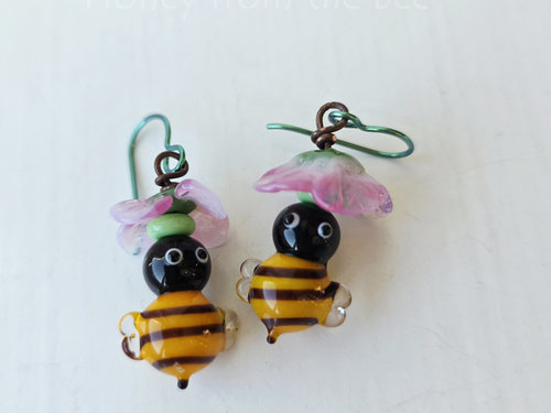 Bee earrings in yellow and black with pink flower