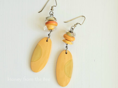 Artisan earrings in shades of orange