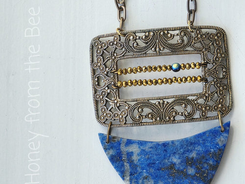 Statement necklace in brass and blue