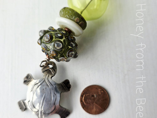 Turtle pendant with green lampwork artisan necklace