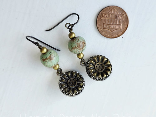 Antique brass button earrings with soft green ceramic beads