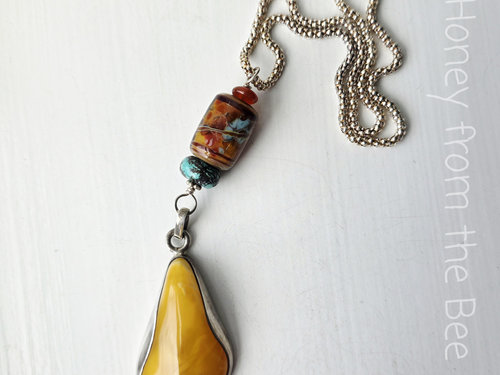 Summer pendant features vintage amber, lampwork and turquoise