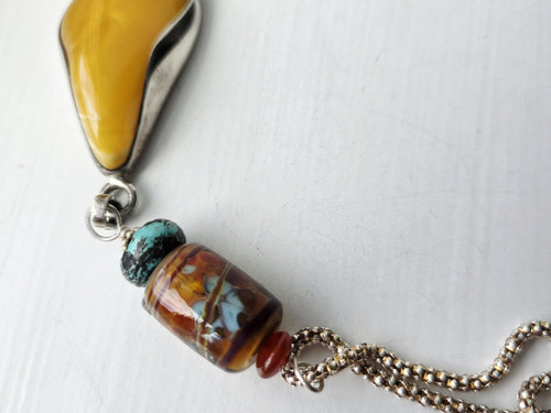 Vintage amber pendant with lampwork in turquoise and orange
