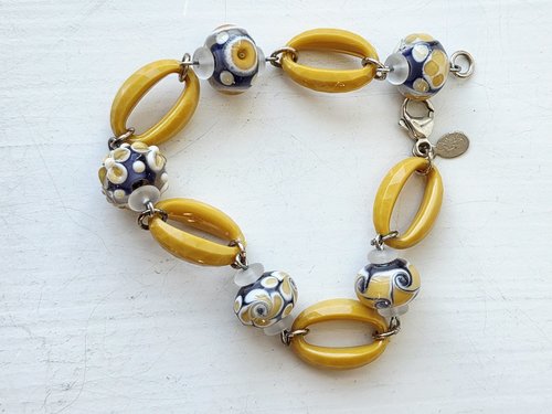 Lavender and yellow lampwork bracelet with yellow acrylic hoops