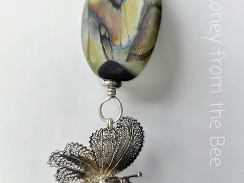 Butterfly theme necklace in peach and turquoise