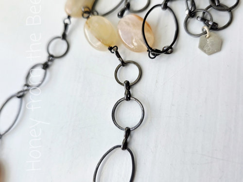 Peach Moonstone necklace with butterfly theme