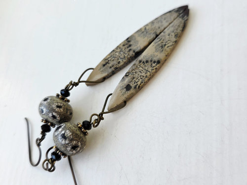 Long dangle earrings in black and tan