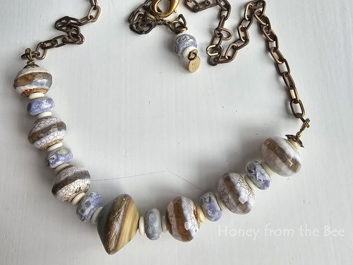 Beach artisan necklace in creams and lavender