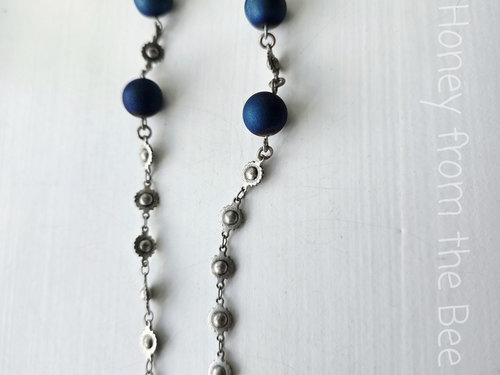 conch style chain with blue beads