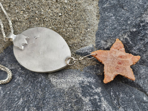 Back of sterling silver ocean inspired pendant