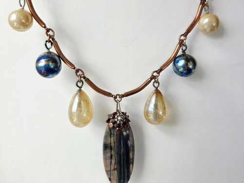 Artisan necklace in copper, blue and yellow
