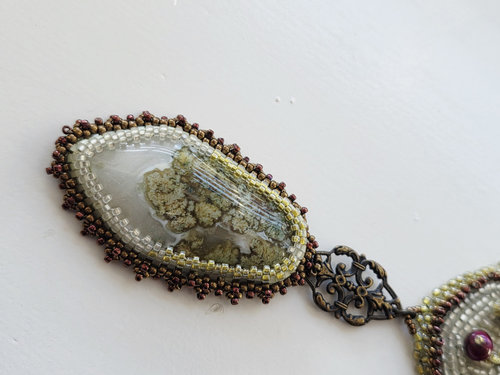 Moss Agate necklace bead embroidered in white, red and green