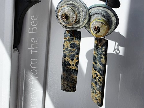 Statement earrings for the beach in grey blue and yellow