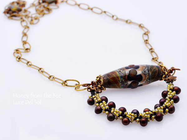 One of a kind necklace of art glass, seed beads, and pearls