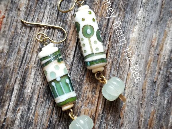 green and white lampwork earrings