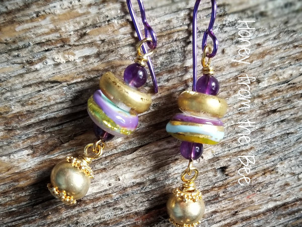 Gold and purple earrings