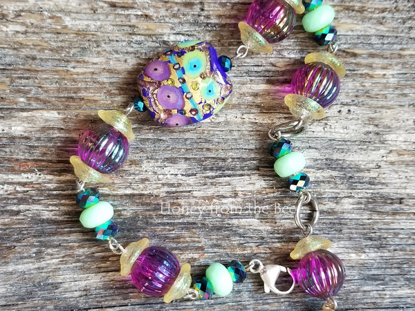 purple and green lampwork bracelet