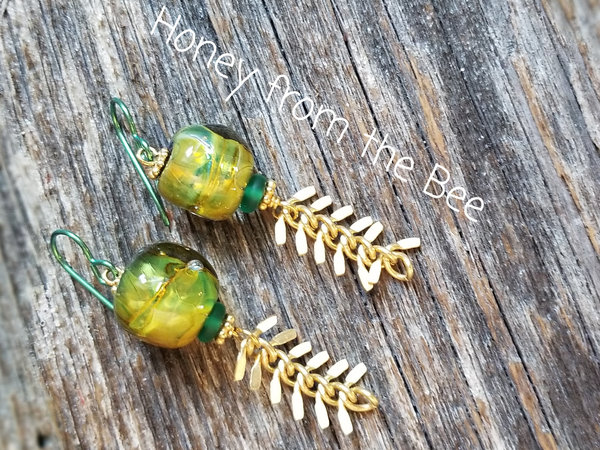 Green and gold artisan earrings