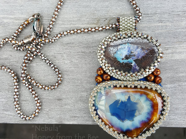 One of a Kind Artisan Pendant features boulder opal and ceramic cabochon with pearls
