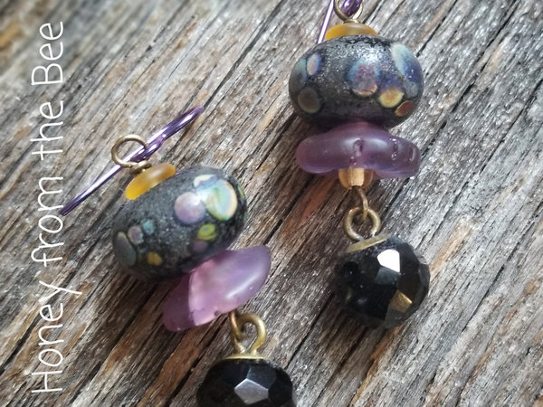 Purple and black earrings