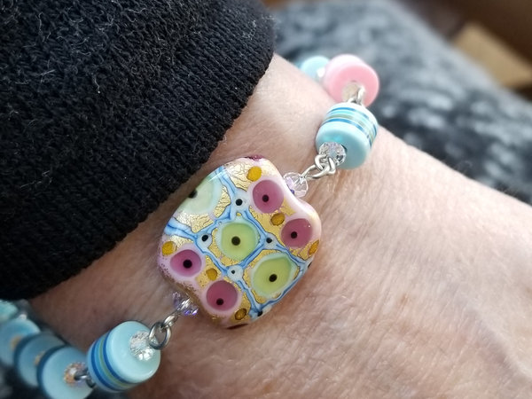 Pink, blue and gold artisan bracelet