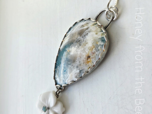 Plume Agate pendant with white flower dangle