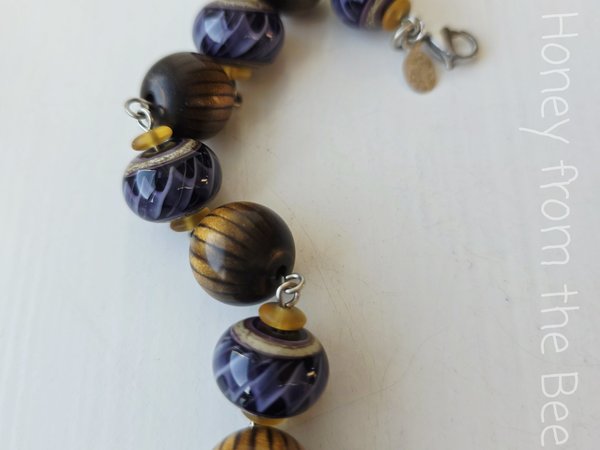 Purple and brown artisan bracelet