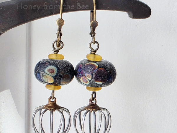 Raku lampwork earrings in black and yellow