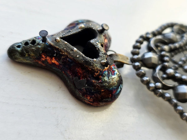 Raku heart necklace with upcycled buckle focal