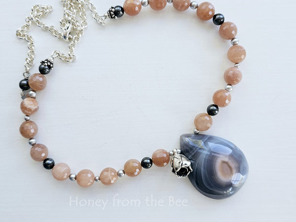 Peach and grey gemstone necklace features Botswana Agate and peach moonstone