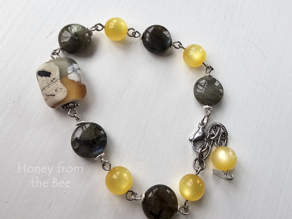 Yellow and grey beaded bracelet