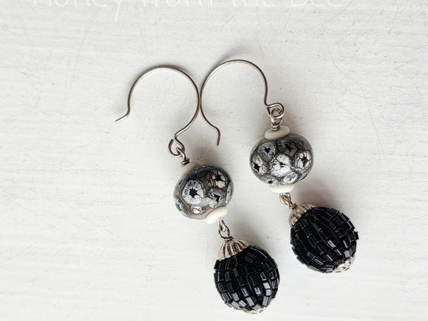 Black and white earrings in lampwork and seed beads