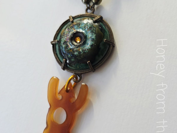 Boho style necklace in green and brass