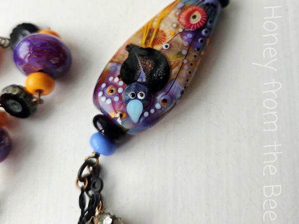 Lampwork necklace in purple, blue and orange