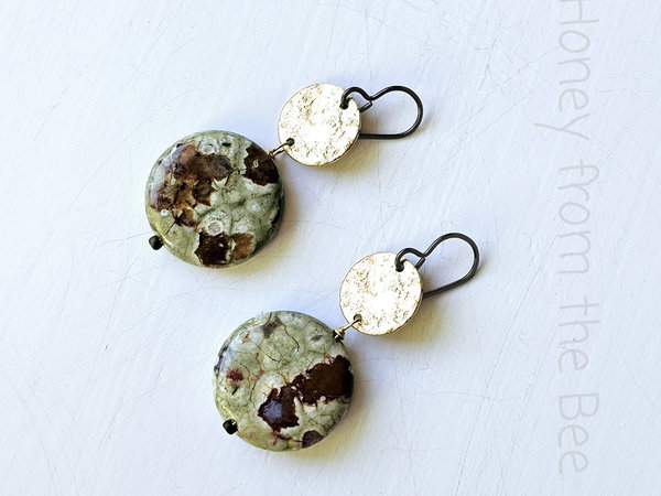 Green and brown stone earrings with textured brass
