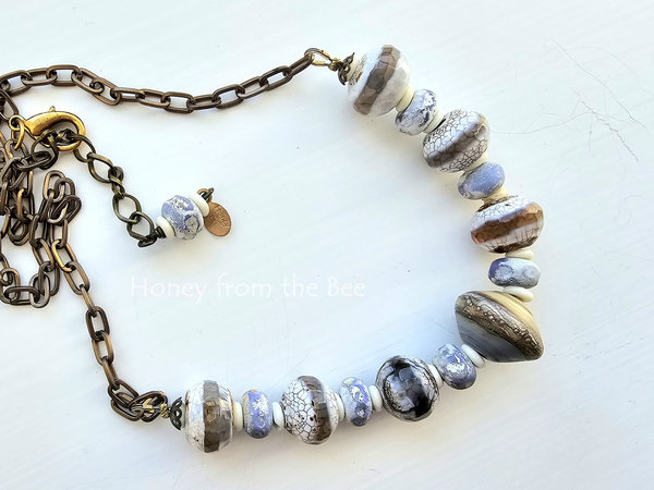 Beach necklace in shades of white, tan and lavender